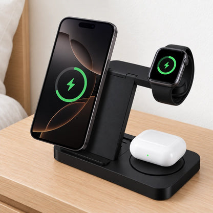 Base de carga 3 en 1 negra cargando a la vez un móvil, un reloj y unos auriculares