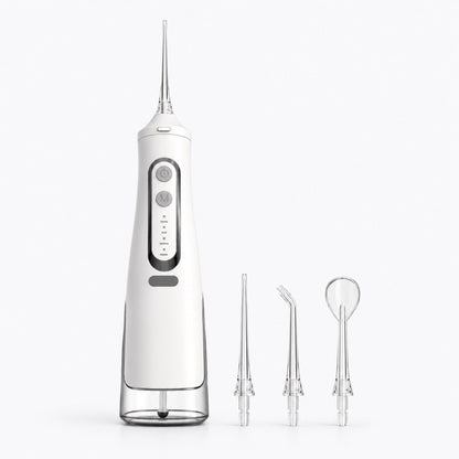 Irrigador dental blanco con boquillas transparentes