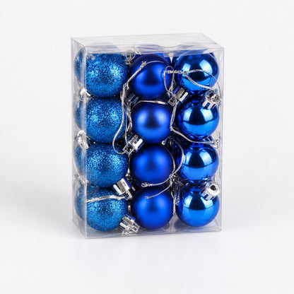 Caja transparente con 24 bolas azules de Navidad